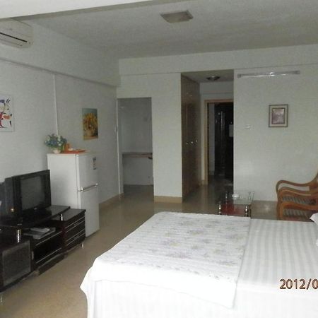 Xingfu Hotel Нанинг Стая снимка