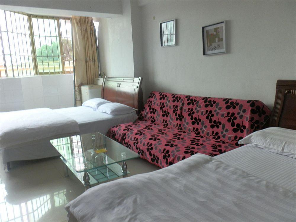 Xingfu Hotel Нанинг Екстериор снимка
